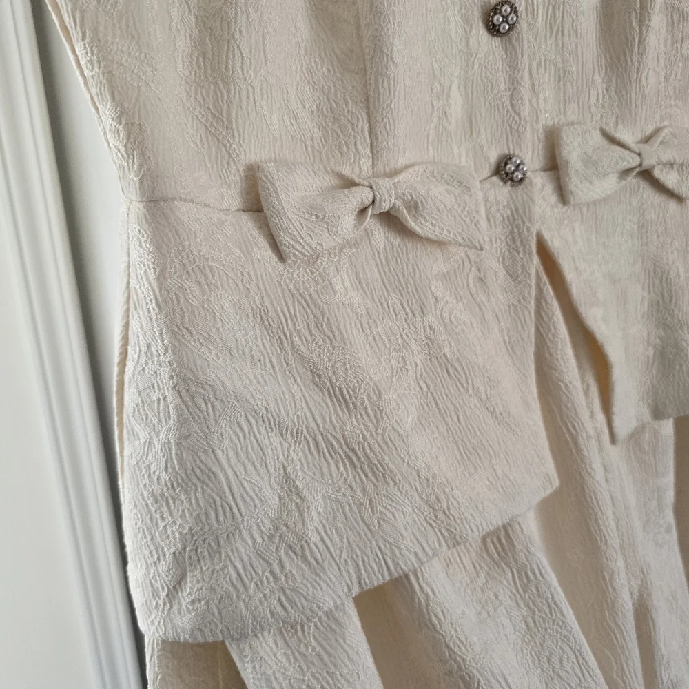 SENI & CADE Bow Trim Bubble Hem Short Dress - Picture 7 of 9